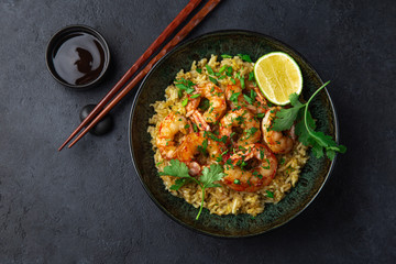 fried rice and prawn in  bowl