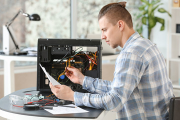 Electronic technician working in service center