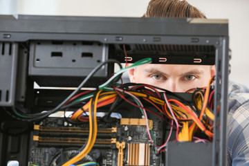 Electronic technician working in service center