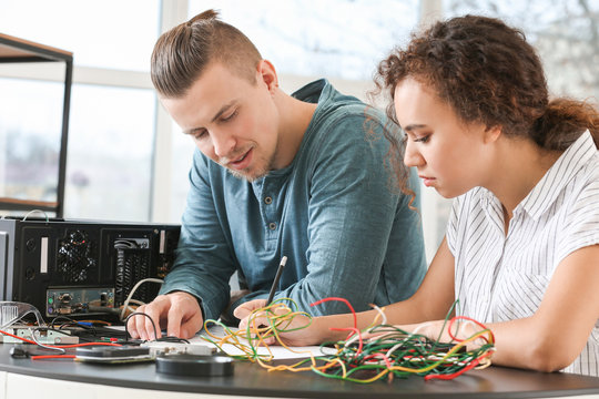 Electronic technicians working in service center