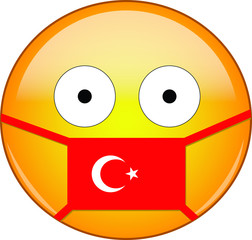 Yellow scared emoji in Turkish medical mask protecting from SARS, coronavirus, bird flu and other viruses, germs and bacteria and contagious disease as well as toxic smog in Turkey.