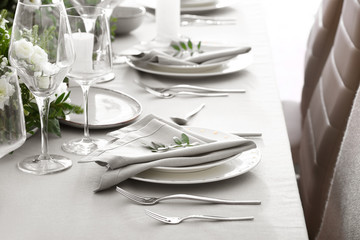Beautiful table setting for wedding celebration in restaurant