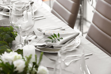 Beautiful table setting for wedding celebration in restaurant