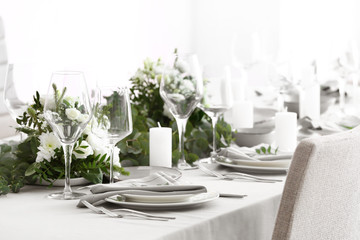 Beautiful table setting for wedding celebration in restaurant