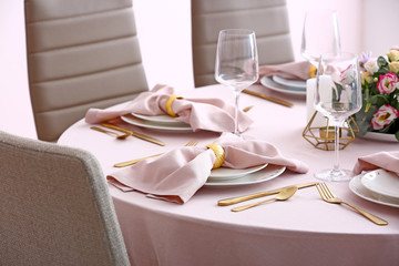 Beautiful table setting for wedding celebration in restaurant