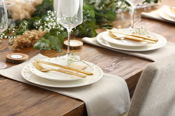 Beautiful table setting for wedding celebration in restaurant