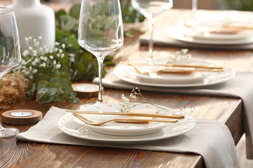 Beautiful table setting for wedding celebration in restaurant