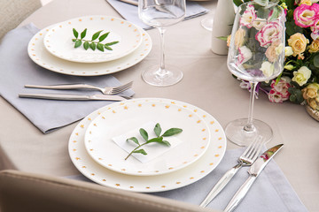 Beautiful table setting for wedding celebration in restaurant