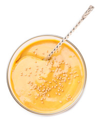Glass of tasty honey mustard sauce on white background
