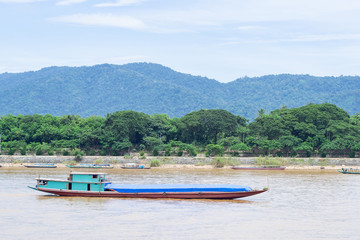 Fototapeta na wymiar Boat on the Mekong River in Chiang Saen, Chiang Rai province, Thailand. Landscape beautiful of nature.