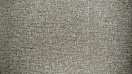 a photo of the pattern and texture of the gray wallpaper that adorns the walls