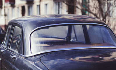 vintage retro car in the city. rear view