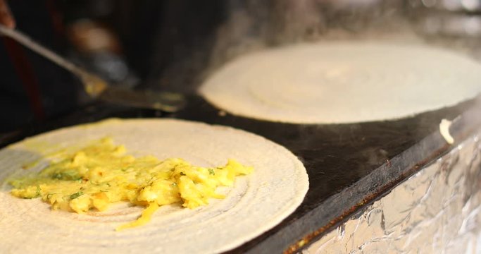 Cooking masala dosa at Surajkund Mela food stall