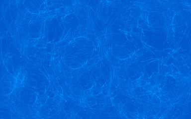 Blue background with marble texture with scratches and scuffs.