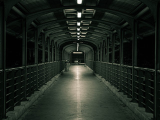 Fototapeta na wymiar Walking on the overpass at night. Black and white tone
