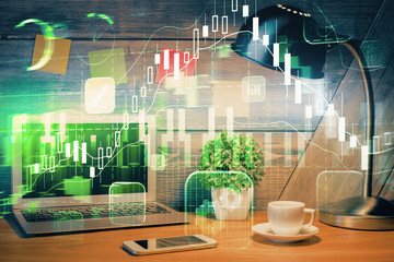 Multi exposure of chart and financial info and work space with computer background. Concept of...