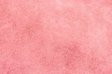 pink violet decorative plaster background,  stucco wall with copyspace, abstract wallpaper close up ,sea salt texture macro