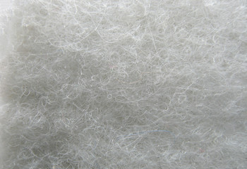 Obraz na płótnie Canvas Cotton wool background close-up. Cotton wool hairs. Abstract background.