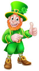 A Leprechaun St Patricks Day cartoon character mascot giving a thumbs up and pointing