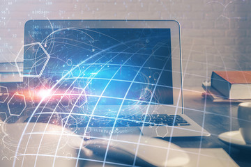 Multi exposure of table with computer and world map hologram. International data network concept.