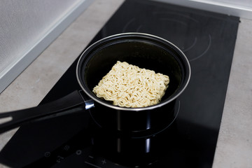 instant soup and noodle on electric stove