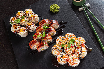 sushi on the black background