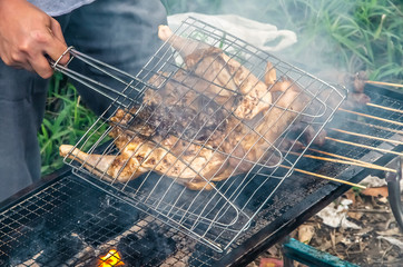 Roast whole chicken outdoors 