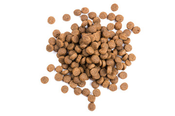 Dry cat food isolated on white background close-up top view