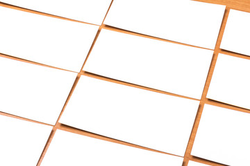 White business cards are stacked on wooden background. close up
