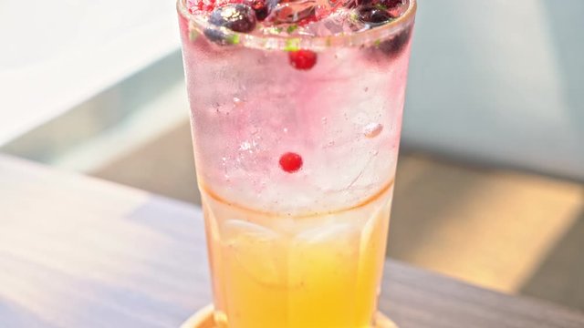 peach and berry soda glass in cafe restaurant