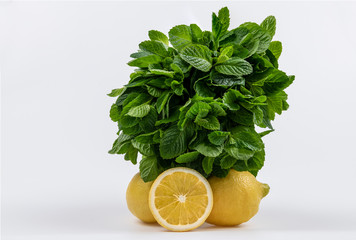 Lemon and mint isolated on white