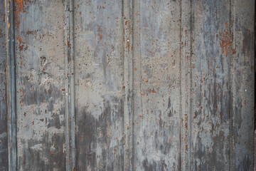 Graphic detail of withered wooden door in medieval town