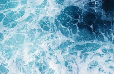 Aerial view to ocean waves.