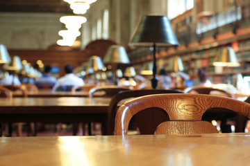 Large wooden table and a chair in the public library