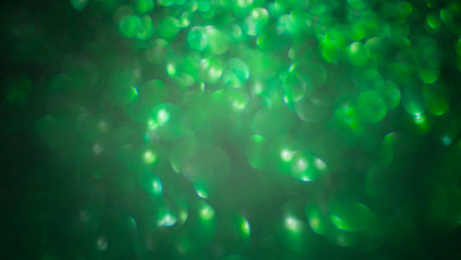 Sparkle, bokeh light moving on a green background