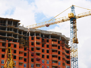 Construction site background.  Crane near building.