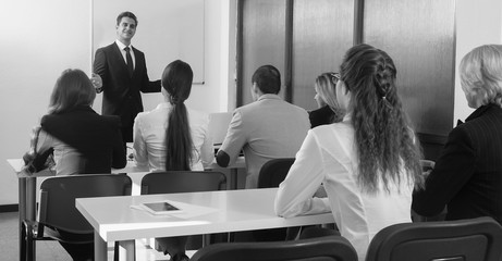 Students listen to lecture in audience