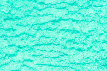 blue texture of an snow surface with pure ice white wave , blue cold clear cryslallized wall background ,decorative plaster background close up , abstract macro wallpaper