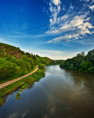 Dawn in the valley of a picturesque river. quiet morning. spring landscape