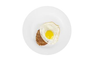 Cutlet, beef steak, lamb with scrambled eggs, on a plate, isolated white background, view from above. Serving for a cafe, a restaurant in the menu