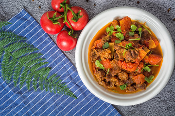 Chili con carne - in American English as simply chili, is a spicy stew containing chili peppers,...