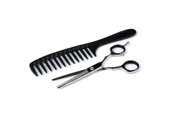 Obraz premium Comb and scissors isolated on white background.