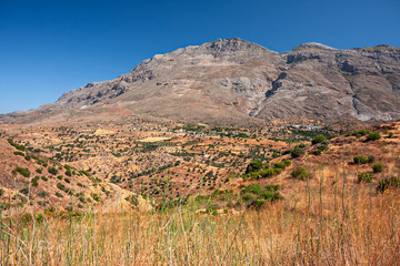 Fototapeta na wymiar Panoramic view of the mountainous and wild landscape of the southern coast of Crete in Greece.