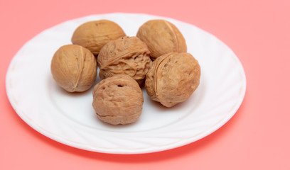 Walnuts in a white plate