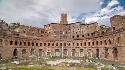 Fototapeta na wymiar A panoramic view on Trajan's Market timelapse on the Via dei Fori Imperiali, in Rome, Italy