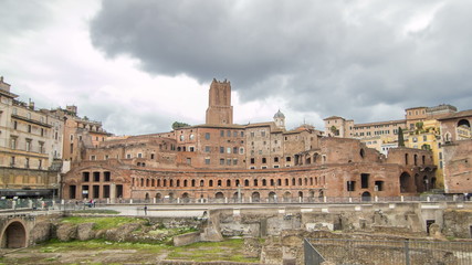 Fototapeta na wymiar A panoramic view on Trajan's Market timelapse on the Via dei Fori Imperiali, in Rome, Italy