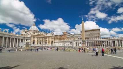 Fototapeta na wymiar St.Peter's Square full of tourists with St.Peter's Basilica and the Egyptian obelisk within the Vatican City timelapse