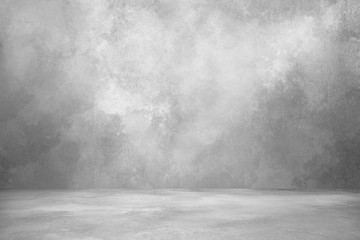 Concrete wall white grey color for background. Old grunge textures with scratches and cracks. White painted cement wall texture.