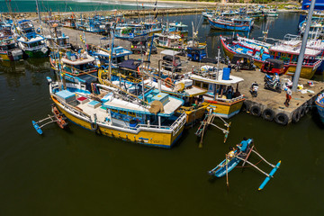 Aerial view of fishing boats and fish market in the south of Sri Lanka