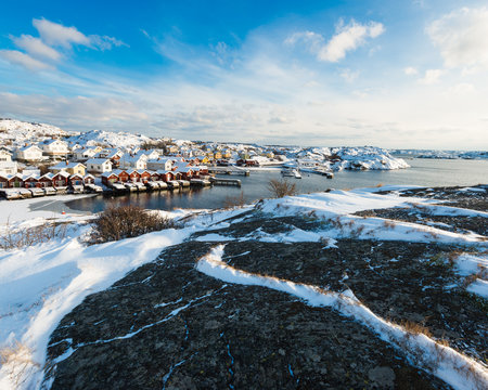 Houses at the coast in winter season, Sweden.